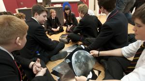 Photo of school children assembling the Moonsaic